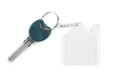 Keys with trinket on light background
