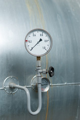 Pressure gauge on the factory marriage.