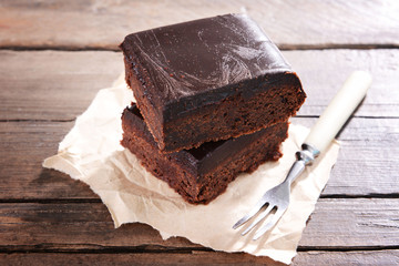 Delicious chocolate cakes on table close-up