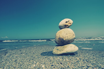 Stones pyramid on seacoast 