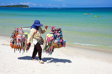 Thai woman selling beachwear at beach in Koh Samui, Thailand.