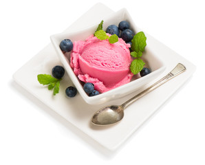 Blueberry ice cream with berry in a bowl