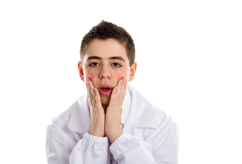 Puzzled boy doctor holding his chin