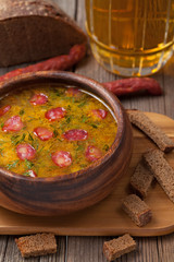 Rustic traditional beer soup with cheese sausage dill croutons a