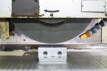 operator grinding surface of mold and die parts