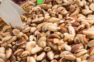 closeup of crunchy brazil nuts in wicker bowl