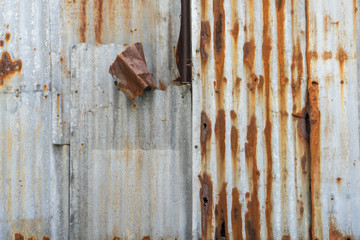 Rusty corrugated metal wall texture background