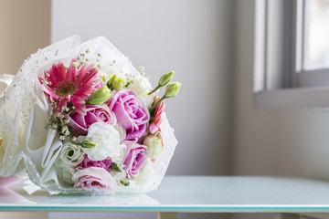 Bouquet on the glass table