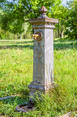 Rusty Drinking Fountain in a Park