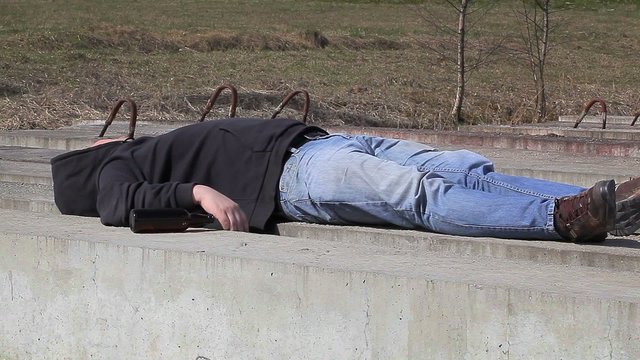 Drunk men sleeping at outdoor