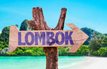Lombok wooden sign with beach background