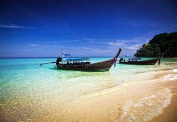 Fototapeta na wymiar Longtail boats on the beautiful beach, Thailand