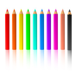 Row of standing color pencils isolated