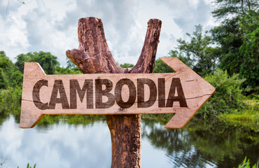 Cambodia wooden sign with forest background