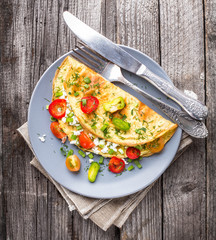 Omelette with vegetables - 82075929