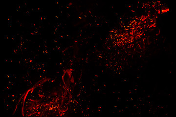 red sparks on a black background - Powered by Adobe