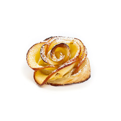 Pastry with apple shaped roses on white background