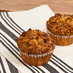 Crunchy Granola Peach Muffins with Butter Pecan Toppings