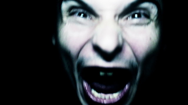 Horror scene screaming man face. Scary evil many faces. Devil