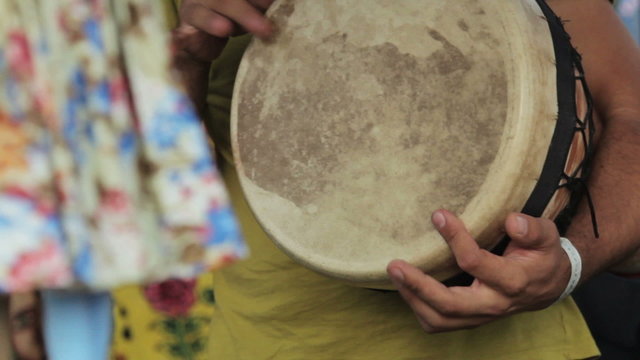 Playing  the drum