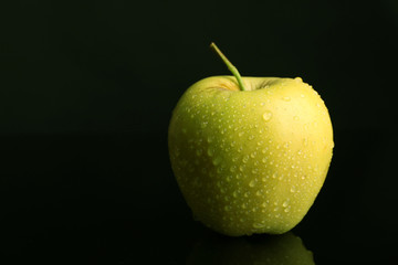 Apple on black background