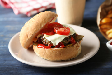 Tasty burger and french fries