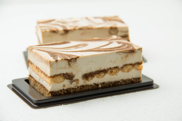 tiramisu cake on a white background