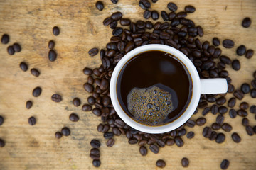 Coffee beans background on wooden, Fresh coffee beans