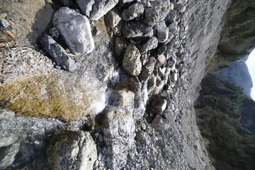 mountain stream with fresh water among the stones