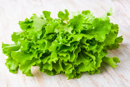 Fresh lettuce on a wooden table