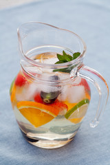 Refreshing white sangria (punch) with fruits, picnic idea