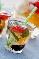 Refreshing white sangria (punch) with fruits, picnic idea
