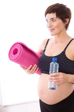 Pregnant woman keeping in shape