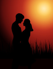 Fototapeta na wymiar Couple in love at sunset