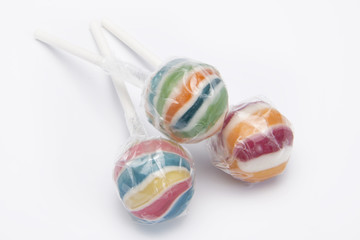 old dutch candy, three lollypops isolated on white background