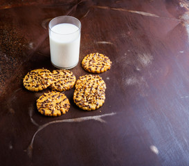 Sweet cakes and a glass of fresh milk