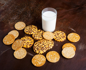 Sweet cakes and a glass of fresh milk