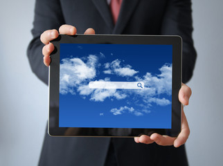 businessman with search application  on a tablet