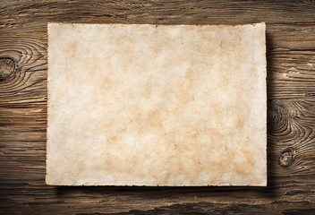 antique parchment on aged dark wood