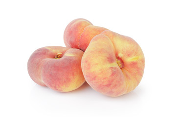 fresh asian flat peaches isolated