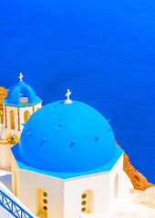 blue dome from a  church in Oia of Santorini island in Greece