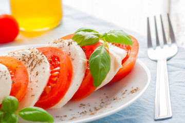 Traditional mozzarella with tomato. Mediterranean salad