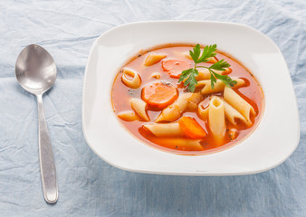 Tomato soup with pasta.