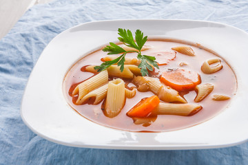 Tomato soup with pasta.