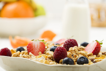 Light, delicious breakfast with cereal and fruit.