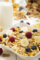 Light, delicious breakfast with cereal and fruit.