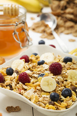 Light, delicious breakfast with cereal and fruit.