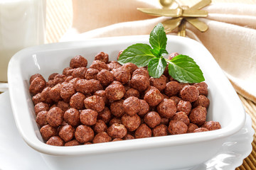 Cereal chocolate balls on wooden table