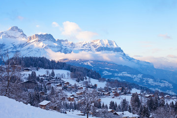 amazing beautiful panoramic view of Combloux village at sunset in french Alps