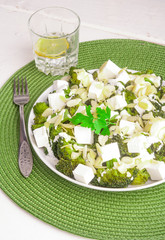 Broccoli salad with feta cheese and almonds
